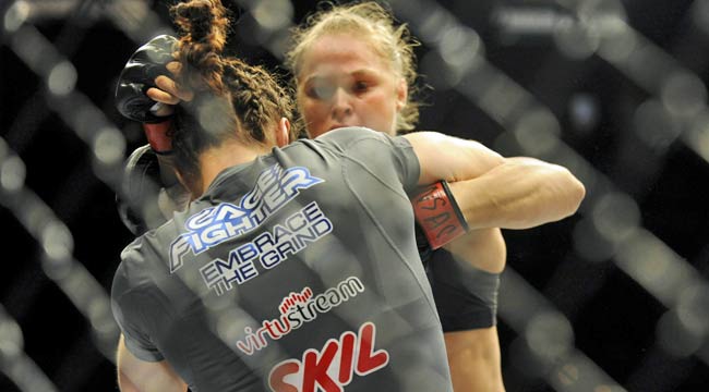 Ronda Rousey keeps her title with a quick win over Sara McMann. (USATSI)