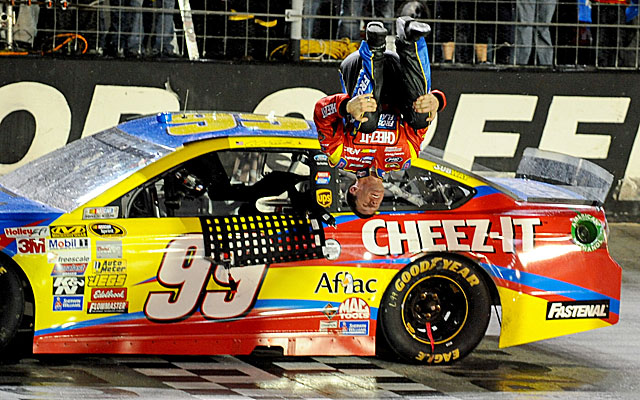 Carl Edwards does a backflip after waiting out the rain to win at Bristol. (USATSI)