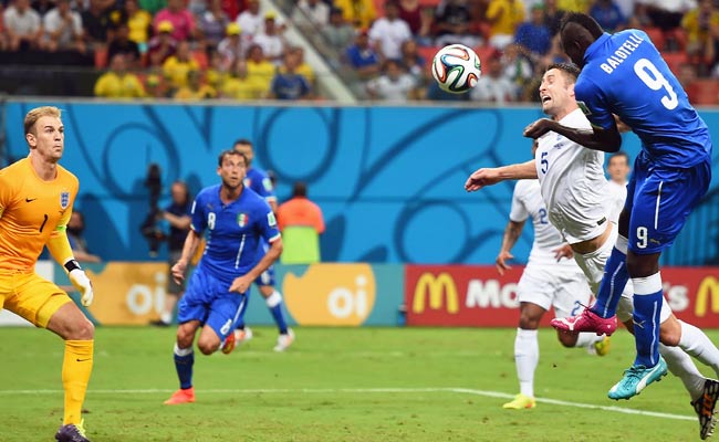 Marco Balotelli knocks it in for the decisive goal for Italy. (Getty Images)