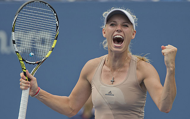 Caroline Wozniacki celebrates her 3-set victory over Maria Sharapova. (USATSI)