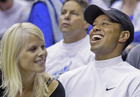 Tiger says his wife, Elin, 'acted courageously' after the accident. 