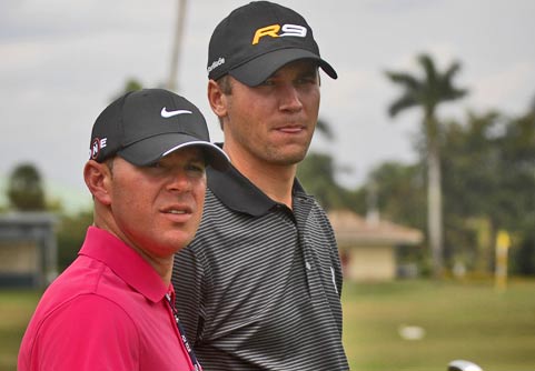 Sean O'Hair (right) works with Sean Foley this week on the range at Doral. 