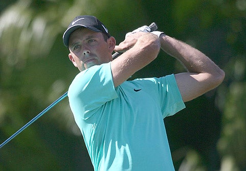 Schwartzel (above) and his friend Els sit at 12 under.