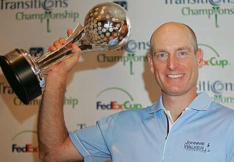 Jim Furyk closes with a 69 to beat K.J. Choi by a shot.