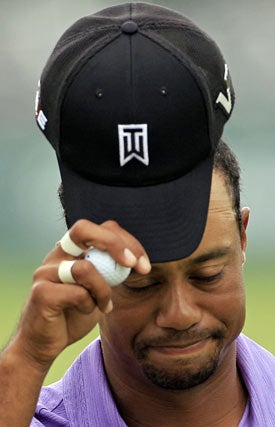 Tiger Woods hits one of his first 10 fairways on Friday. (AP)