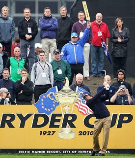 Rickie Fowler gets a dialed-down taste of the first-tee experience during practice Thursday. (Getty Images)