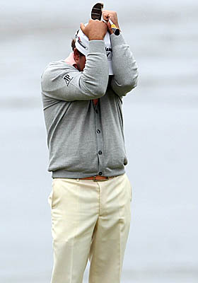 Graeme McDowell celebrates making par on the treacherous 18th hole at Pebble Beach to win the 2010 U.S. Open. (Getty Images)