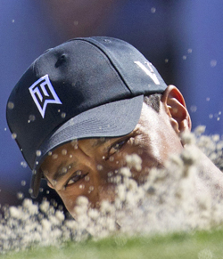 Tiger Woods shows no signs of digging out of the hole he has been in. (AP)
