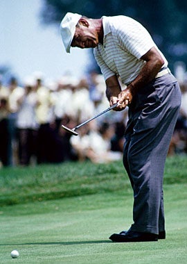 Pictured here at Columbus Country Club in 1964, golf great Ben Hogan follows through on a putt at the PGA Championship. (US Presswire)