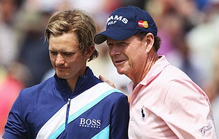 Tom Watson (right) guided his namesake, Tom Lewis (left), during the first two rounds of the Open. (Getty Images)