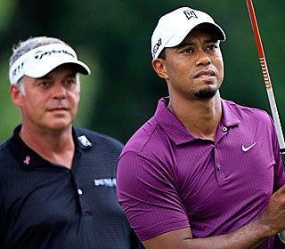 'He played lovely,' says Tiger's playing partner for the day, Darren Clarke. '... Pleased to see.' (Getty Images)