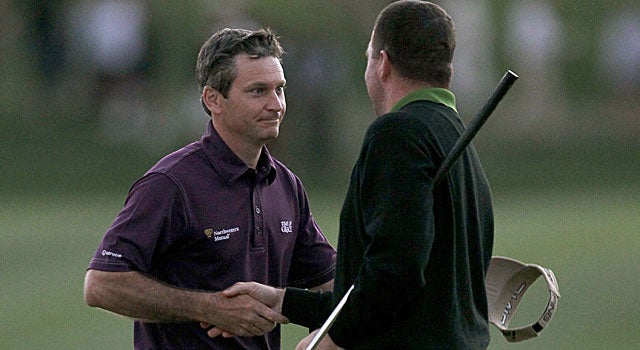 Mark Wilson (left) keeps Robert Garrigus at bay to win the Humana Challenge. (Getty Images)