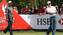 Rory McIlroy (right) rebounds with a 68 in Round 3 as Woods sprints past into the lead.