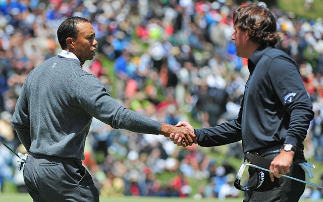 Tiger Woods finishes seven shots up on Phil Mickelson; 'It was impressive,' says Lefty. (US Presswire)