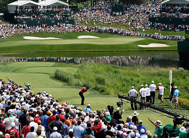 Tiger brings a lot more than his game and power to intimidate to a Sunday round of golf. (Getty Images)
