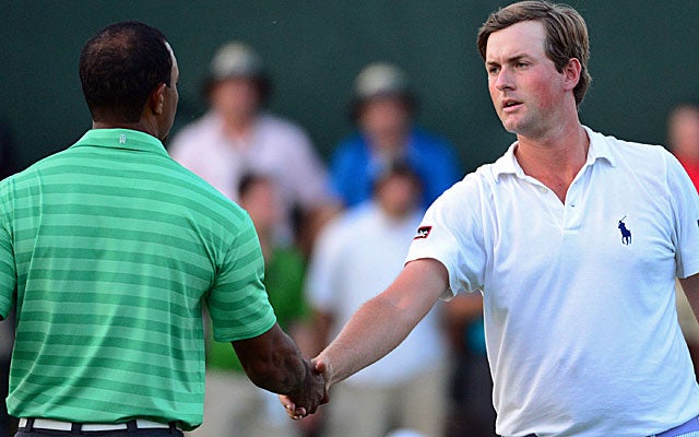 U.S. Open champ Webb Simpson and Greenbrier leader Webb Simpson shakes hands with Tiger. (US Presswire)