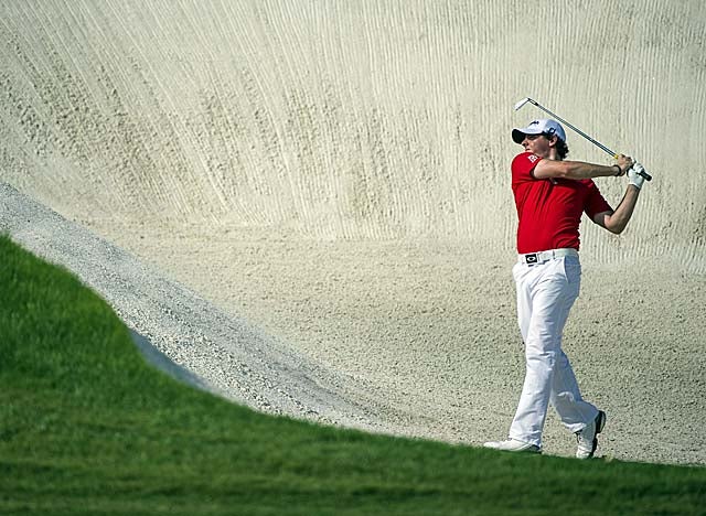 McIlroy overcomes early woes in Dubai to win the European Tour finale. (AP)
