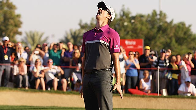 Justin Rose reacts after seeing his potential playoff-forcing putt lip out. (Getty Images)