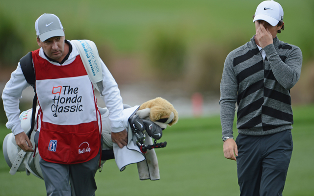 Rory McIlroy grabs his nose. I thought it was your tooth! (Getty Images)