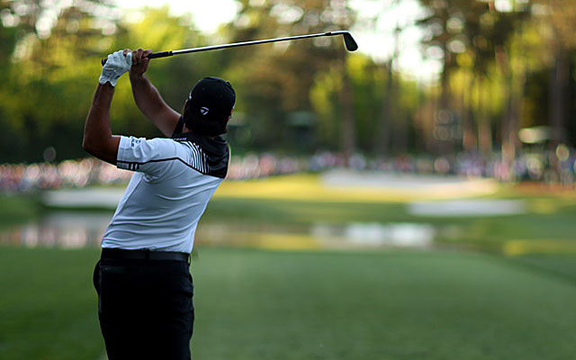 Jason Day unleashes a shot on No. 16 en route to a 4-under 68 to take the second-round lead. (Getty Images)