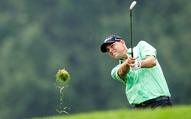 With as many as six players sharing the lead, Bill Haas pulls ahead midway through the final round. (Getty Images)