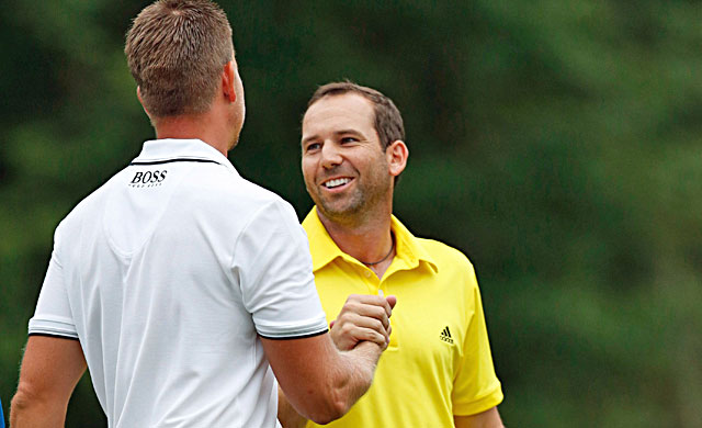 Sergio Garcia (right), who had a two-shot lead at the start of the final round, congratulates Henrik Stenson. (USATSI)