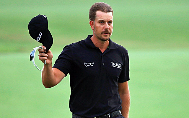 Henrik Stenson walks down the 18th fairway on his way to a victory Sunday in Dubai. (Getty Images)