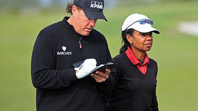 Phil Mickelson -- paired with Condoleezza Rice -- is 5-under par through 15 holes. (USATSI)