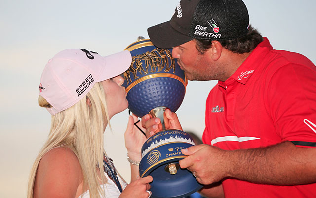 Patrick Reed celebrates with wife Justine, his usual caddie who is on maternity leave. (Getty Images)