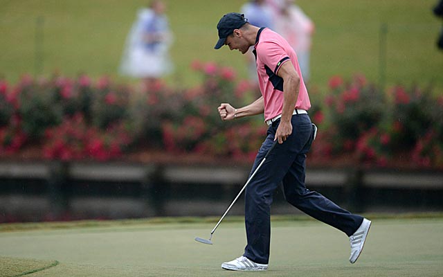 Martin Kaymer celebrates his par putt on No. 17. He wins the title with another par on No. 18. (USATSI)