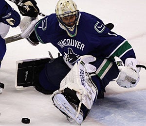 Roberto Luongo is considered the most important piece Vancouver needs to make a good run. (AP)