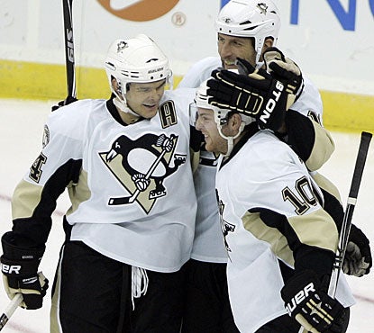 Mark Letestu (10) gets hugs and cheers from his teammates after scoring on the power play. (AP)