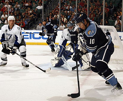 David Booth (10) gets goals for the Panthers in the first and third periods -- his first this season. (Getty Images)