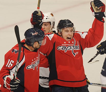 While Alexander Semin gets a nice hat trick, Tomas Fleischmann hits the winner in overtime. (Getty Images)
