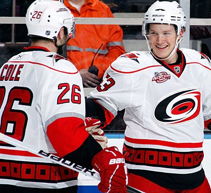 Jeff Skinner (right) has a fine game against the Rangers, with two goals and an assist on Erik Cole's power-play marker. (Getty Images)