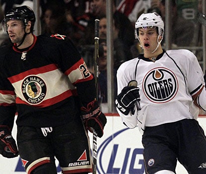 Rookie Taylor Hall (right) starts Edmonton's goalfest just 1:53 into the first period. Taylor has 2 goals in his young career. (AP)