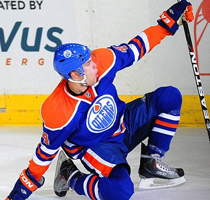 Taylor Hall, the first overall pick in the draft, celebrates the winner, his fifth goal of the season. (AP)