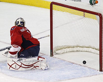 Semyon Varlamov reacts too late on Ryan Getzlaf's shot with 57 seconds left in overtime. (US Presswire)