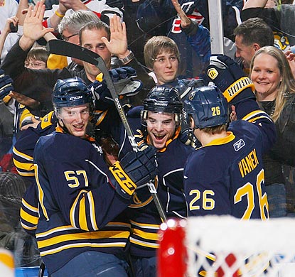 Buffalo teammates and fans show their appreciation for Drew Stafford after his third goal.  (Getty Images)