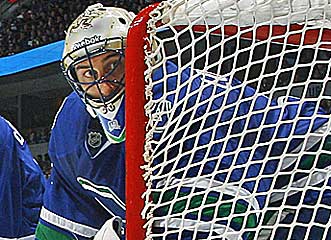 Roberto Luongo has stayed strong in goal with younger backup Cory Schneider giving him a push. (Getty Images)
