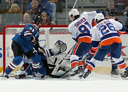 John Tavares wrists the puck in the net over goalie Craig Anderson with 68 seconds left in overtime. (Getty Images)
