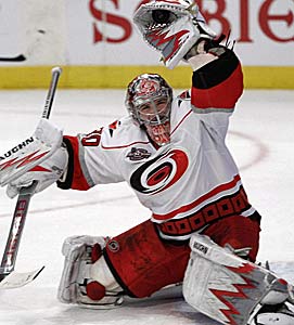 Goalie Cam Ward is one of the dwindling connections to Carolina's Cup champions. (AP)