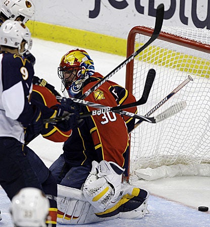 Panthers goalie Scott Clemmensen fails to stop a game-tying goal by Chris Thorburn (not pictured). (AP)