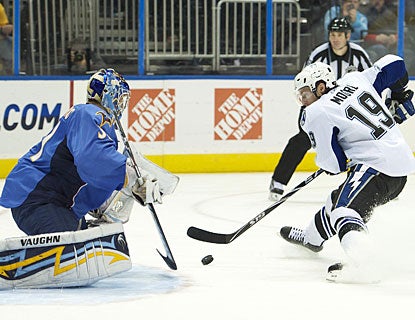 While top scorer Steven Stamkos (37 goals) gets two in regulation, Dominic Moore takes care of business in the shootout. (US Presswire)