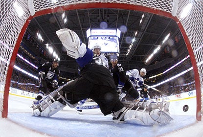 Dwayne Roloson guards his net well, stopping everything en route to his third shutout in 10 games in January. (Getty Images)