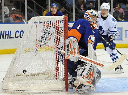 New York's emergency backup Mikko Koskinen does not fare too well in his NHL debut, giving up goals on the first two shots. (AP)