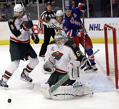 Jose Theodore stops 40 shots and continues to get the best of the Rangers, improving to 13-3-2 in 18 starts against New York. (AP)