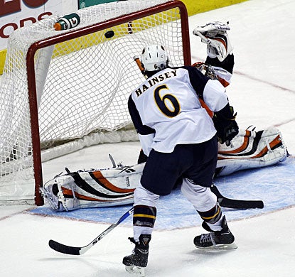 Ron Hainsey completes quite an impressive comeback by Atlanta with the winning goal  in overtime. (AP)