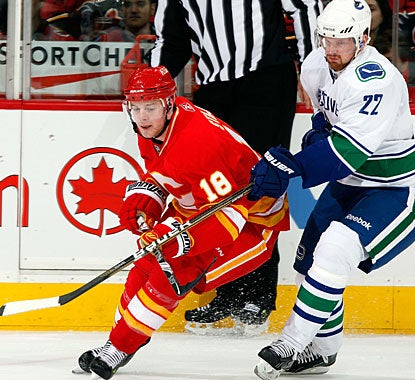 With his two goals, Daniel Sedin reaches a career-high 37 scored in a season for Vancouver. (Getty Images)