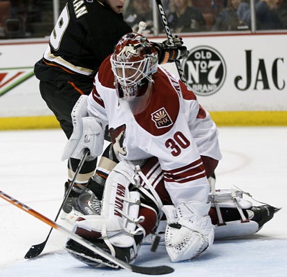 Ilya Bryzgalov makes one of 36 saves against his former team in the Coyotes' win over the Ducks. (AP)